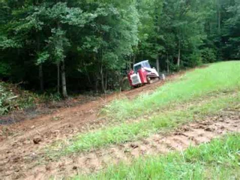 skid steer hill site www.tractorbynet.com|skid steer loader max slope.